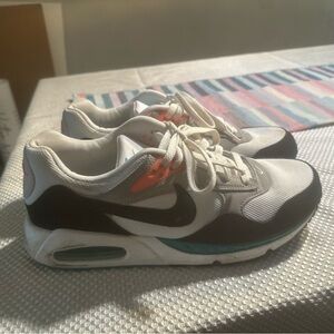 Nike Air Max 1 Sneakers with Black, White, and Teal Accents